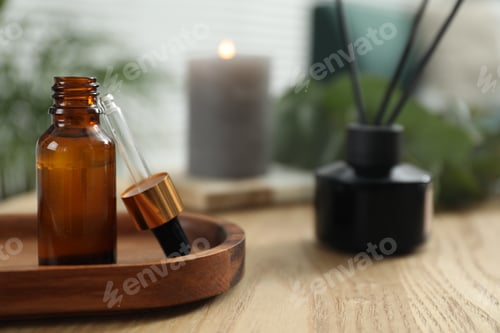 Preview: Aromatherapy. Bottle of essential oil on wooden table