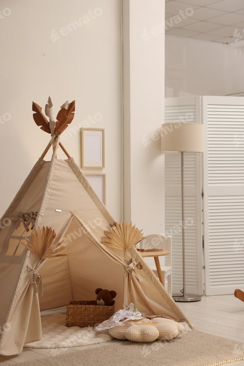 Preview: Stylish wigwam with dry leaves in child's room