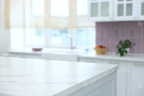 Preview: Empty white table in kitchen, closeup. Stylish interior