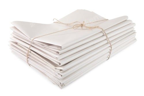 Preview: Stack of folded newspapers isolated on white