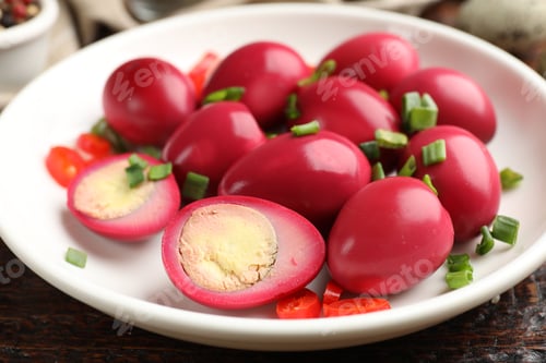 Preview: Pickled quail eggs on wooden table, closeup