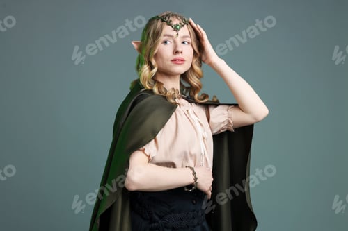 Preview: Portrait of beautiful elf girl on grey background