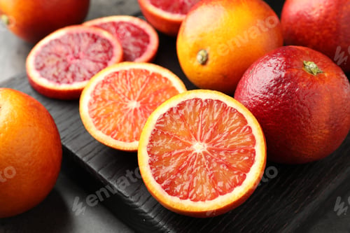 Preview: Ripe Sicilian oranges on grey table, closeup