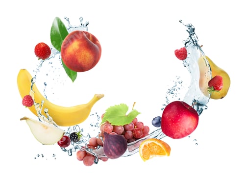 Preview: Fresh fruits and water splash in air against white background