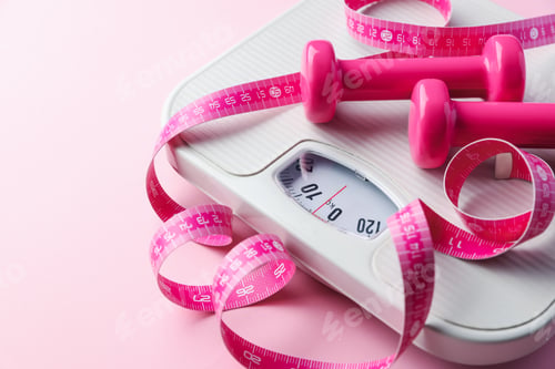 Preview: Scales, dumbbells and measuring tape on light pink background, closeup