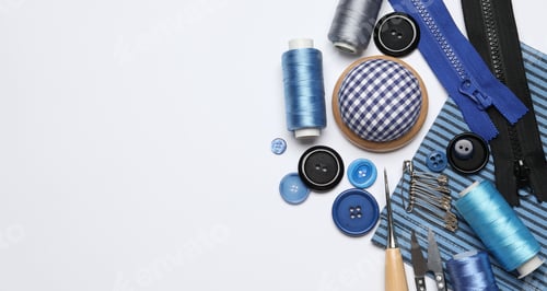 Preview: Different sewing supplies on white background, flat lay. Space for text
