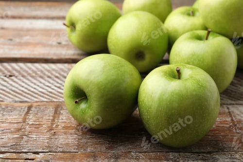 Preview: Fresh ripe green apples on wooden table, closeup