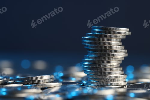 Preview: Many stacked coins on table against blurred background, closeup. Space for text