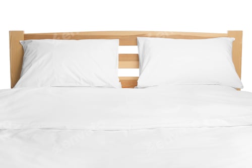 Preview: Comfortable bed with clean linens isolated on white