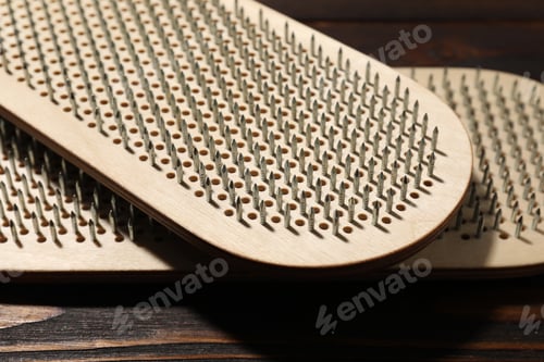 Preview: Nail standing practice. Sadhu boards on floor, closeup