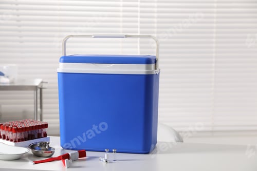 Preview: Portable medical refrigerator on white table in laboratory