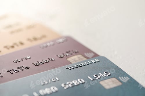 Preview: Many credit cards on gray background, closeup