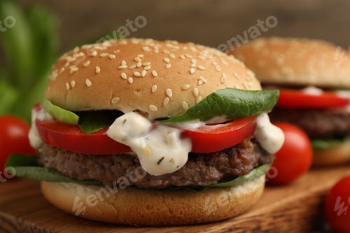 Preview: Delicious burger with meat patty on table, closeup