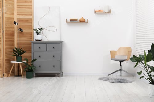 Preview: Stylish room with chair, chest of drawers and houseplants, space for text. interior design
