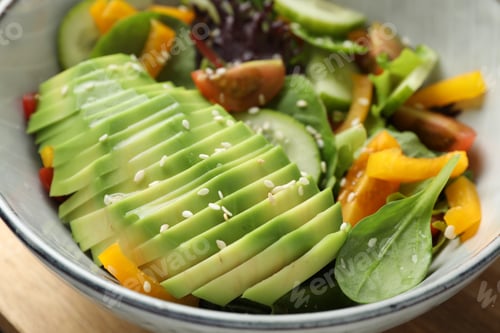 Preview: Healthy dish high in vegetable fats in bowl on table, closeup