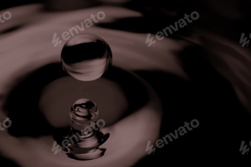 Preview: Soy sauce drop falling into liquid, closeup