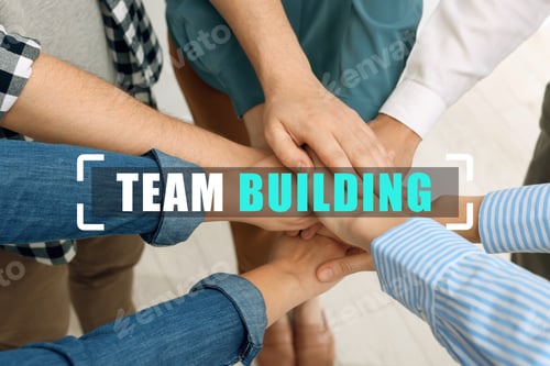 Preview: Team building. Group of people joining hands, closeup
