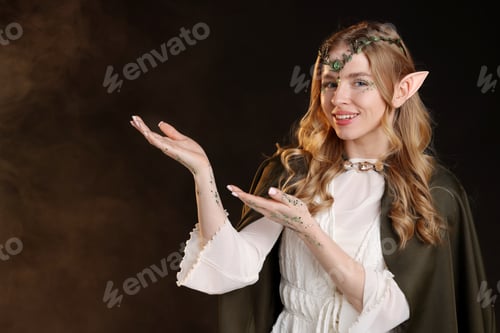 Preview: Beautiful elf girl on black background with smoke, space for text
