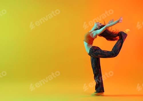 Preview: Young woman performing hip-hop dance on color background, space for text