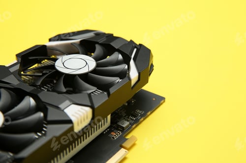 Preview: Computer graphics card on yellow background, closeup. Space for text