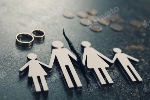 Preview: Divorce and alimony concept. Family figure with crack between wife and husband on table
