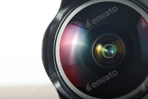 Preview: Professional camera lens on light background, closeup. Photographer's equipment