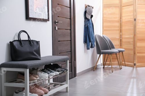 Preview: Hallway with stylish furniture, shoes and clothes. Interior design
