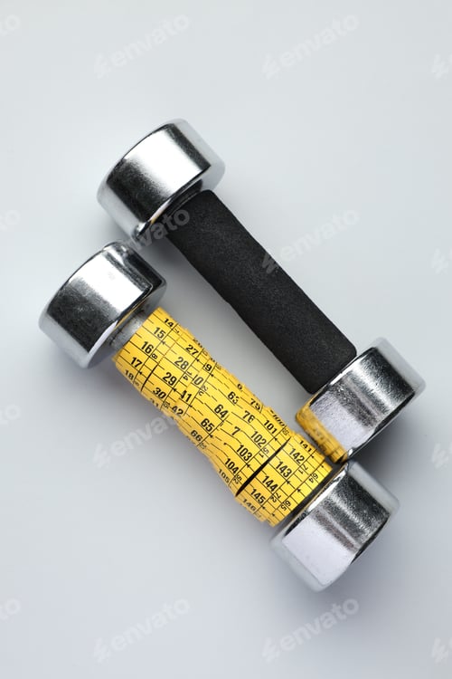 Preview: Dumbbells and measuring tape on white background, flat lay