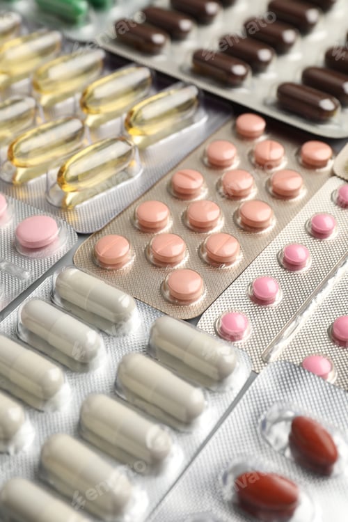 Preview: Many blisters with pills as background, closeup
