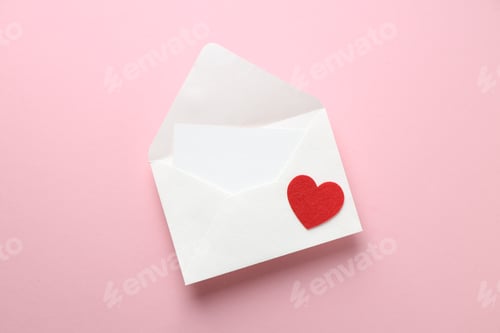 Preview: Happy Valentine's day. Envelope with greeting card and decorative heart on pink background, top view