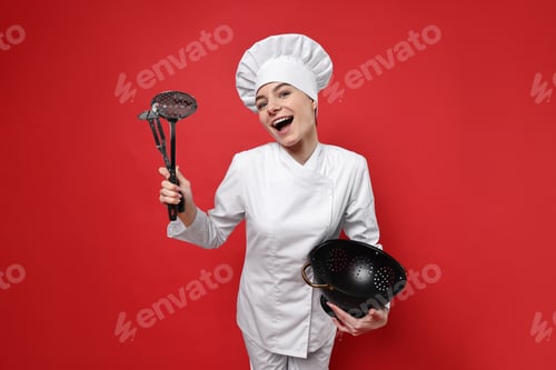 Preview: Professional chef with kitchen utensils having fun on red background