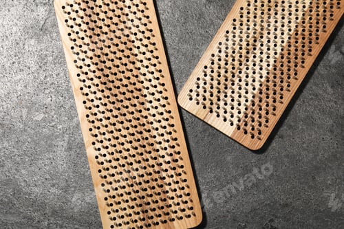 Preview: Nail standing practice. Sadhu boards on gray textured background, flat lay