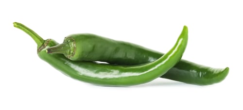 Preview: Fresh green chili peppers isolated on white