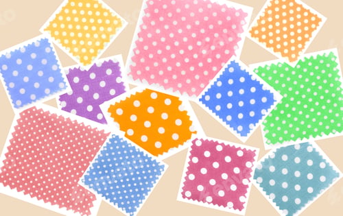 Preview: Fabric swatches with polka dots in various colors on beige background, collection