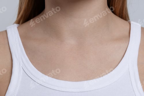 Preview: Woman with normal skin on light background, closeup