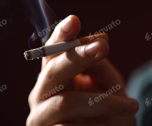 Preview: Man smoking cigarette on black background, closeup