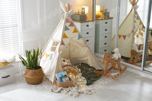 Preview: Cute wigwam with fairy lights and toys in stylish child's room