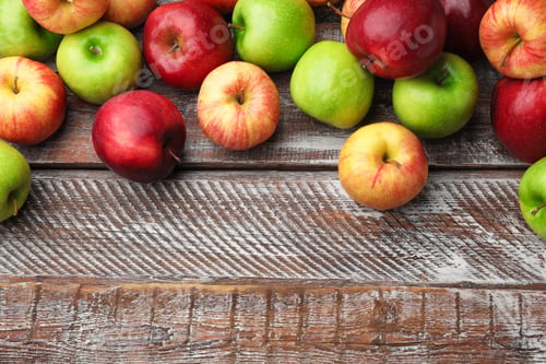 Preview: Fresh ripe red and green apples on wooden table, flat lay. Space for text