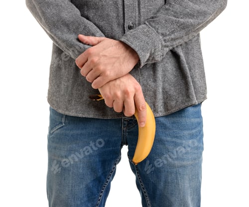 Preview: Urology. Man with banana on white background, closeup