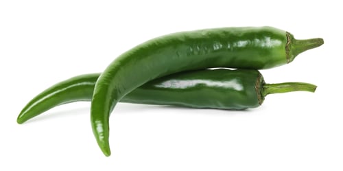 Preview: Fresh green chili peppers isolated on white