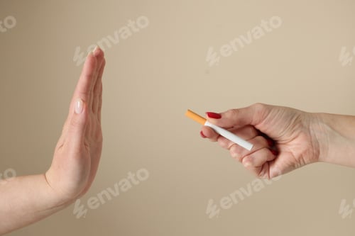 Preview: Woman refusing cigarette on blurred background, closeup