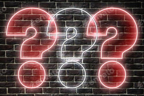 Preview: Three neon question marks on brick wall