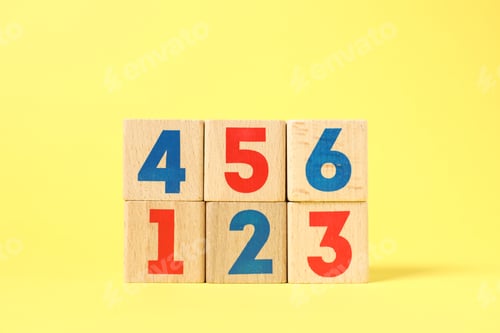Preview: Wooden cubes with numbers on yellow background