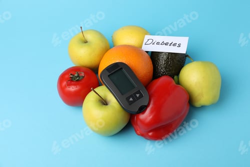 Preview: Diabetes. Fresh products and digital glucometer on light blue background