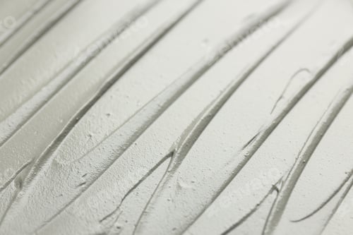 Preview: Mud therapy. Natural clay paste for facial and body care as background, closeup