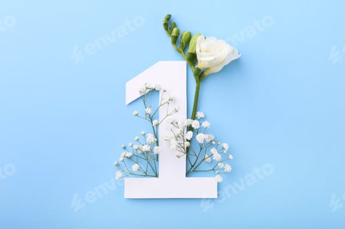 Preview: Paper number 1 and beautiful flowers on light blue background, top view