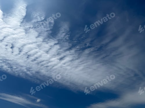 Preview: Beautiful blue sky with fluffy white clouds