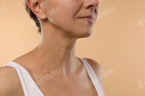 Preview: Woman with healthy skin on beige background, closeup. Space for text