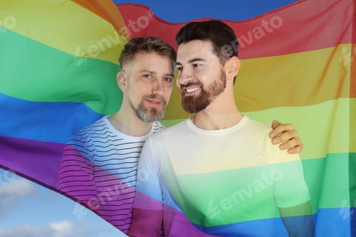 Preview: Happy gay couple, double exposure with pride flag