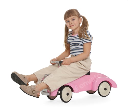Preview: Little child driving toy car on white background